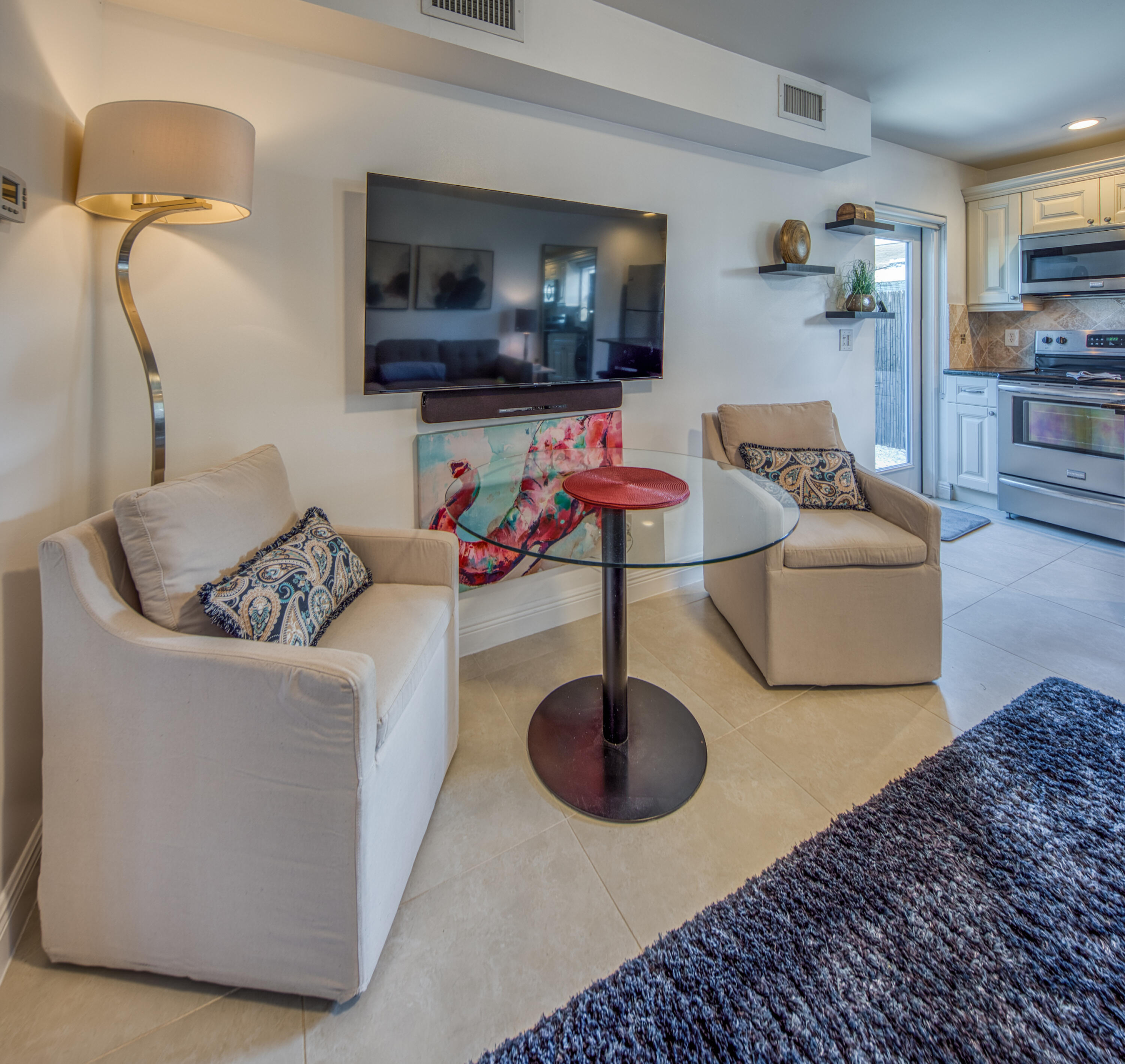 1331 North N Street, Unit GUEST HOUSE Lake Worth Beach, FL 33460 - Photo 15 of 23 a living room with furniture and a flat screen tv