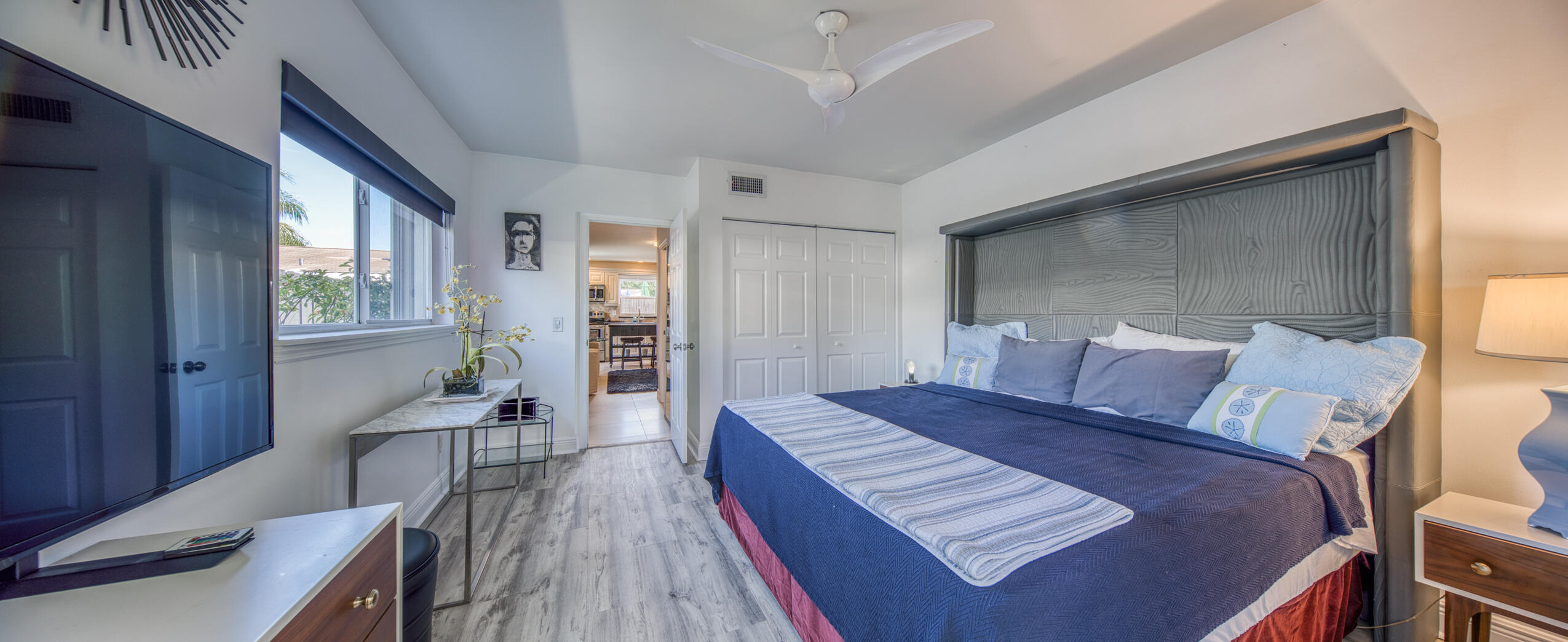 1331 North N Street, Unit GUEST HOUSE Lake Worth Beach, FL 33460 - Photo 18 of 23 a bed room with a bed and a chair