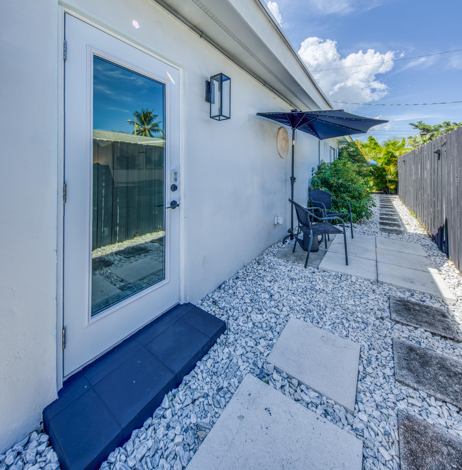 1331 North N Street, Unit GUEST HOUSE Lake Worth Beach, FL 33460 - Photo 23 of 23 a room with furniture and a potted plant