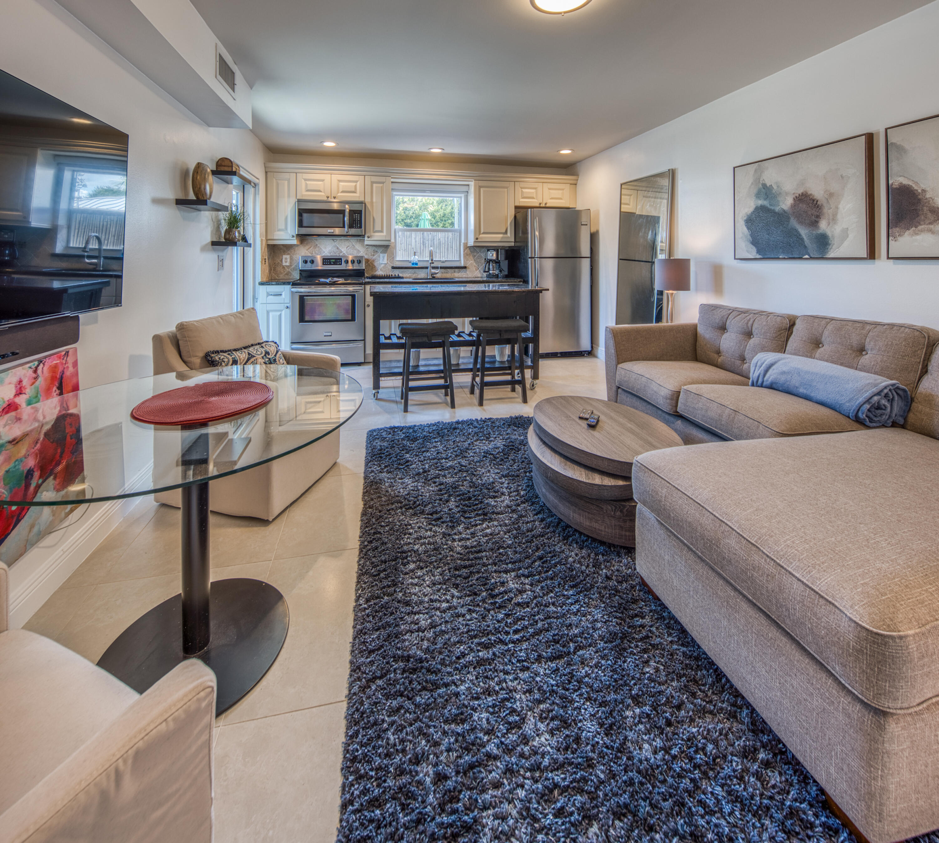 1331 North N Street, Unit GUEST HOUSE Lake Worth Beach, FL 33460 - Photo 4 of 23 a living room with furniture and wooden floor