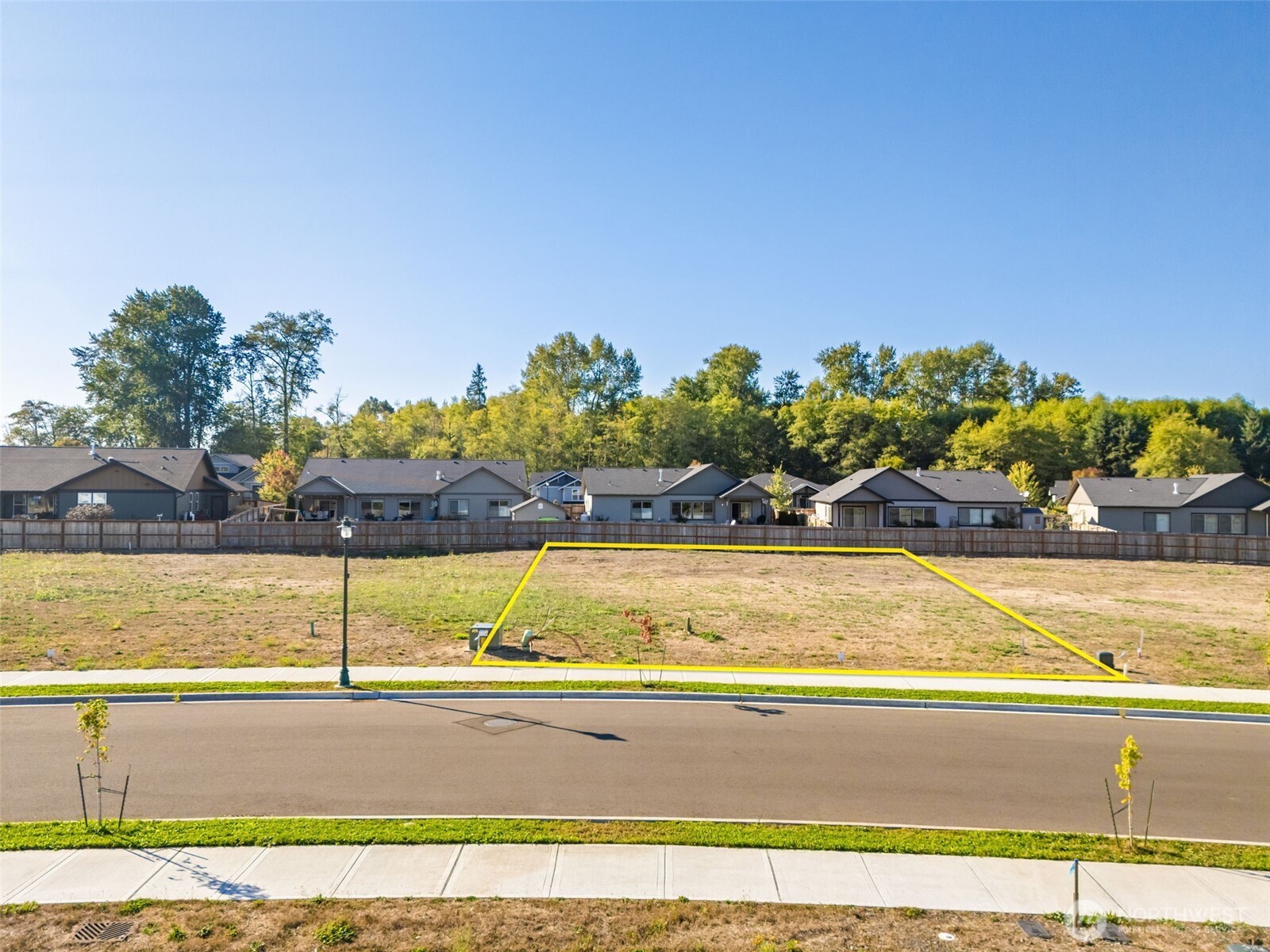 71 Dover Lane Sequim, WA 98382 - Photo 3 of 20 a view of a swimming pool with an outdoor seating and a yard