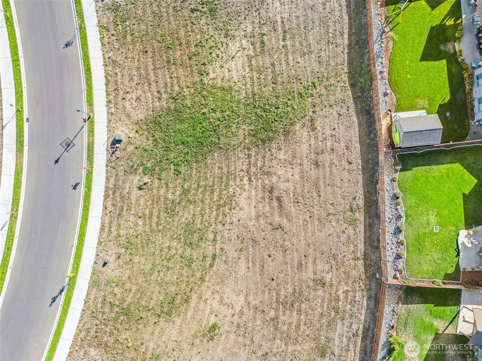 71 Dover Lane Sequim, WA 98382 - Photo 5 of 20 a bathroom with a shower curtain and a large window with garden view