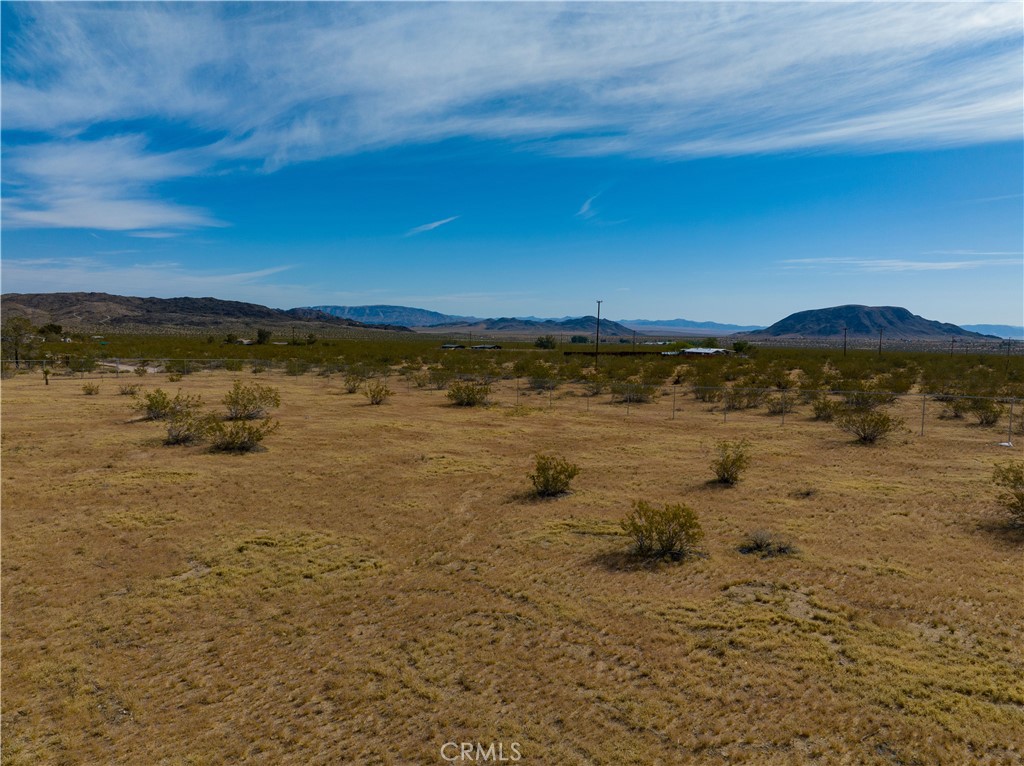 56785 Encantado Road Landers, CA 92285 - Photo 12 of 21 a view of an ocean beach and mountain