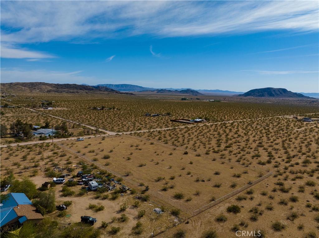 56785 Encantado Road Landers, CA 92285 - Photo 4 of 21 a view of lake and mountain