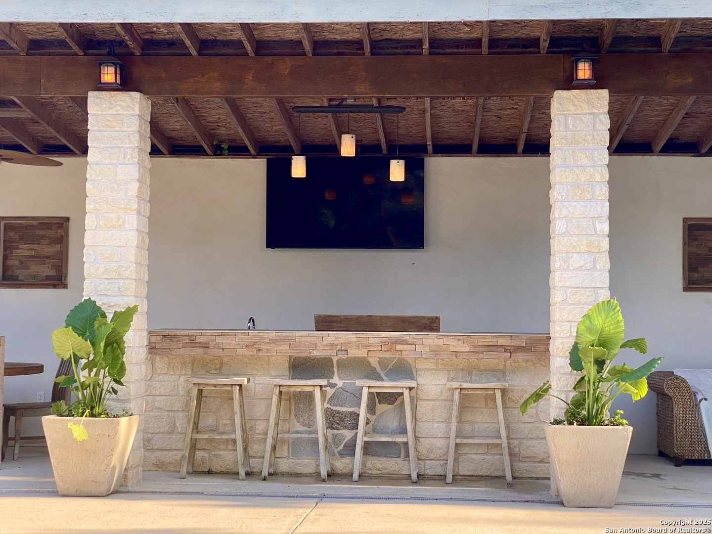 512 County Road 348 Concan, TX 78838 - Photo 6 of 39 a view of a chairs and table in a patio