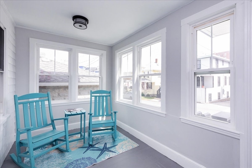 22 Berkley Road, Unit 2 Hull, MA 02045 - Photo 8 of 39 a view of a room with a window and balcony