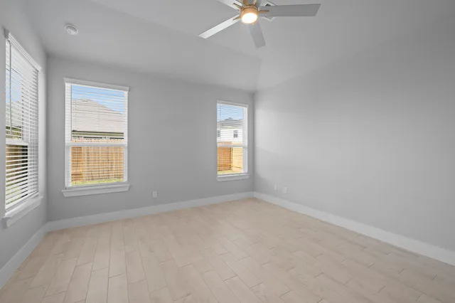 a white bath tub sitting in a bathroom