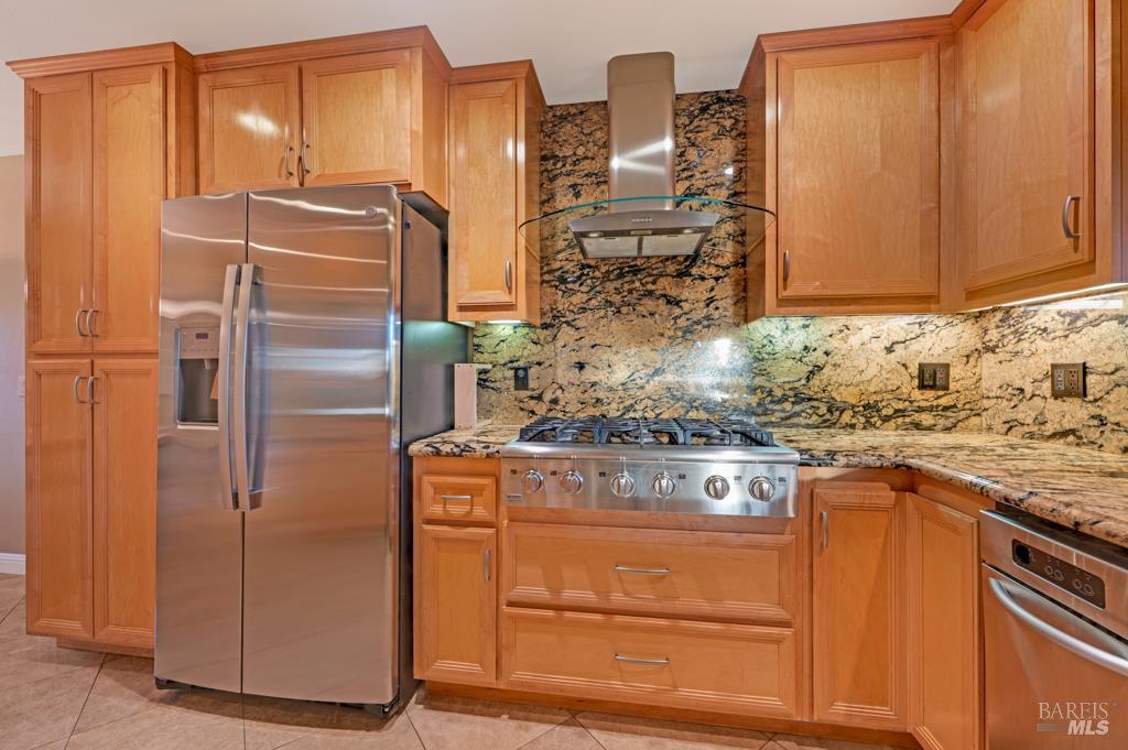 2531 Del Rosa Avenue Santa Rosa, CA 95404 - Photo 13 of 41 a kitchen with stainless steel appliances granite countertop cabinets and refrigerator