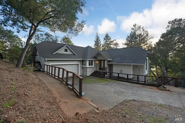 a view of a house with a yard