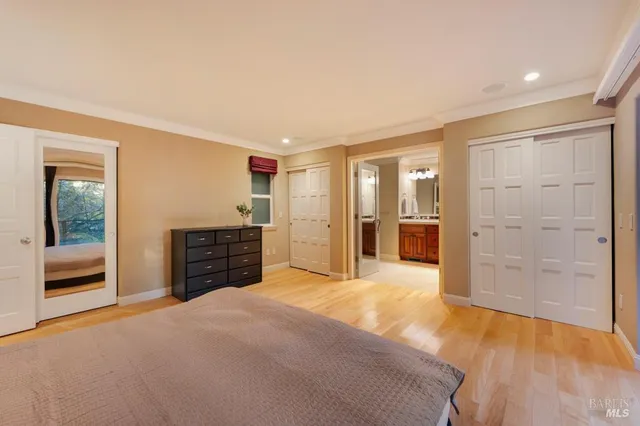 a big room with closet and a bathroom