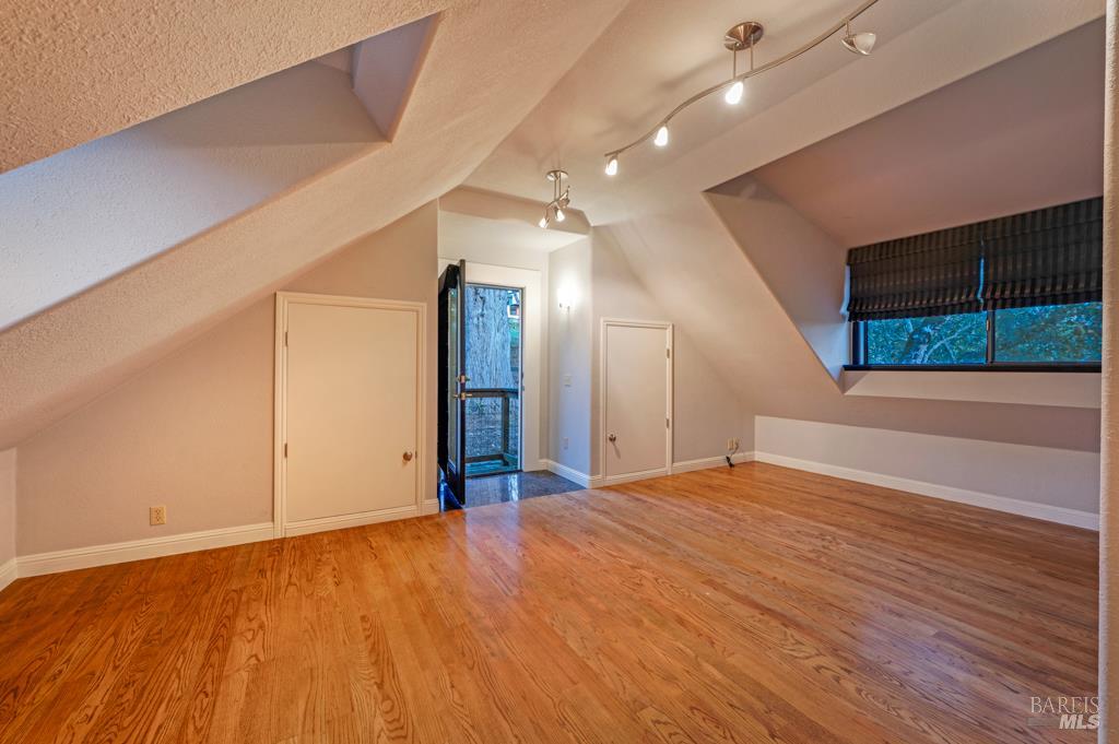 2531 Del Rosa Avenue Santa Rosa, CA 95404 - Photo 33 of 41 a view of an empty room with wooden floor and a window