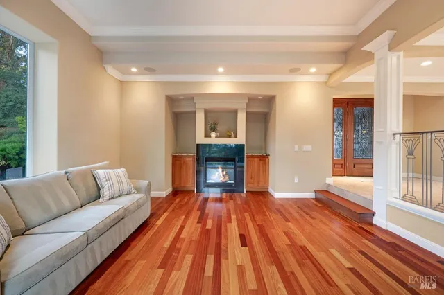 a living room with a couch and a fireplace