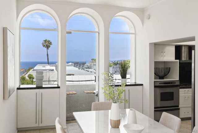 a outdoor living space with furniture and flowers