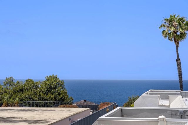 a view of a city with tall buildings