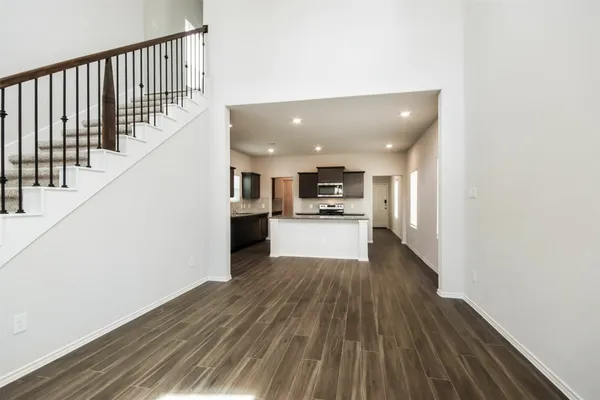a view of kitchen with wooden floor