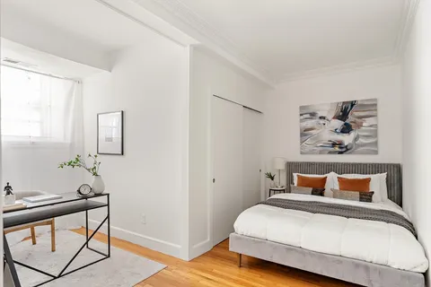 a view of a workspace with furniture