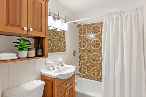 a front view of a house with parking area