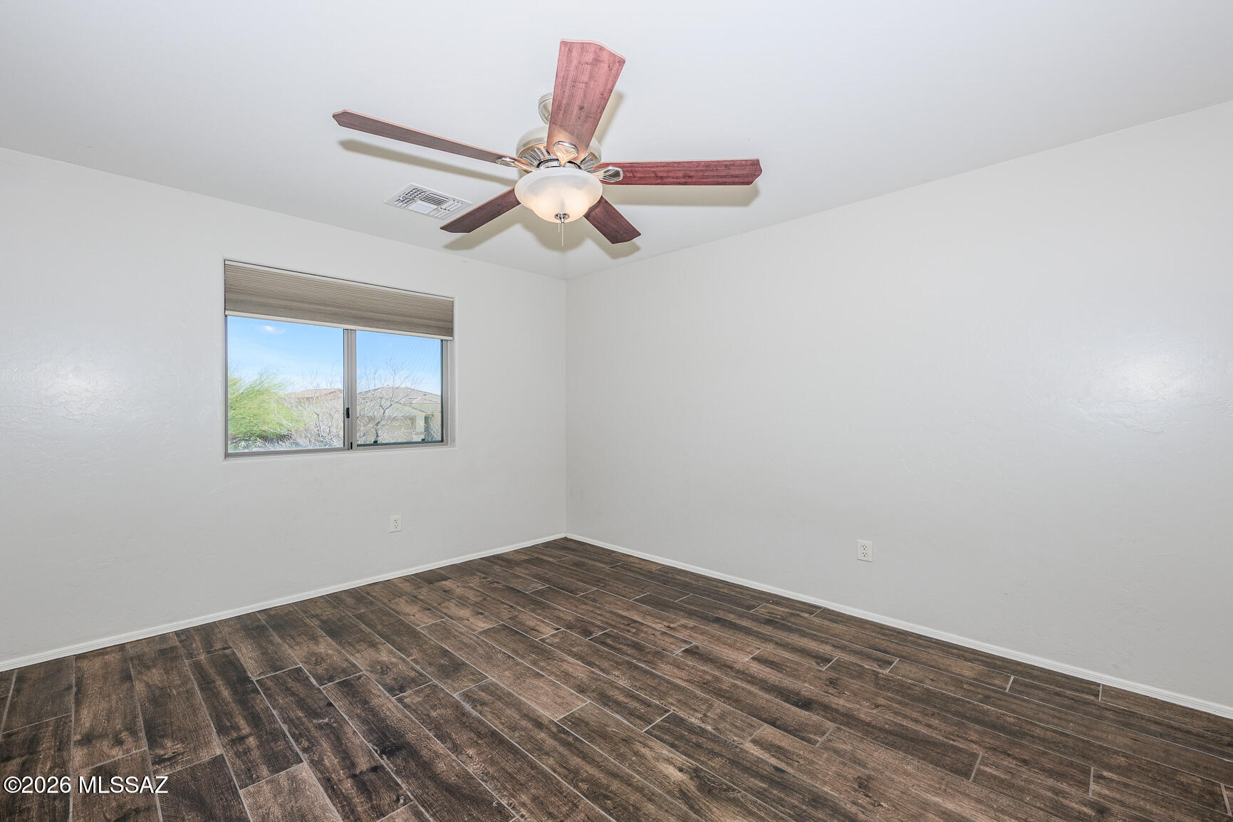 728 South Porter Routh Place Vail, AZ 85641 - Photo 20 of 36 a view of empty room with wooden floor