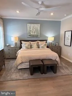 a bedroom with a bed and a night stand