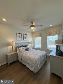 a bedroom with bed and window