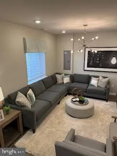 a living room with furniture and a couch