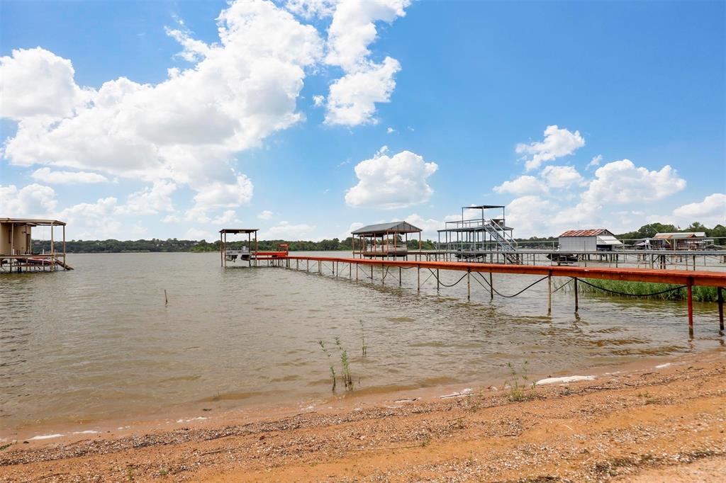 8048 Woodvale Road Fort Worth, TX 76135 - Photo 8 of 27 View of dock with a water view