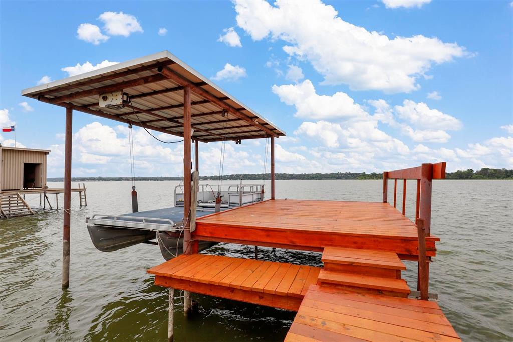 8048 Woodvale Road Fort Worth, TX 76135 - Photo 9 of 27 View of dock with a water view