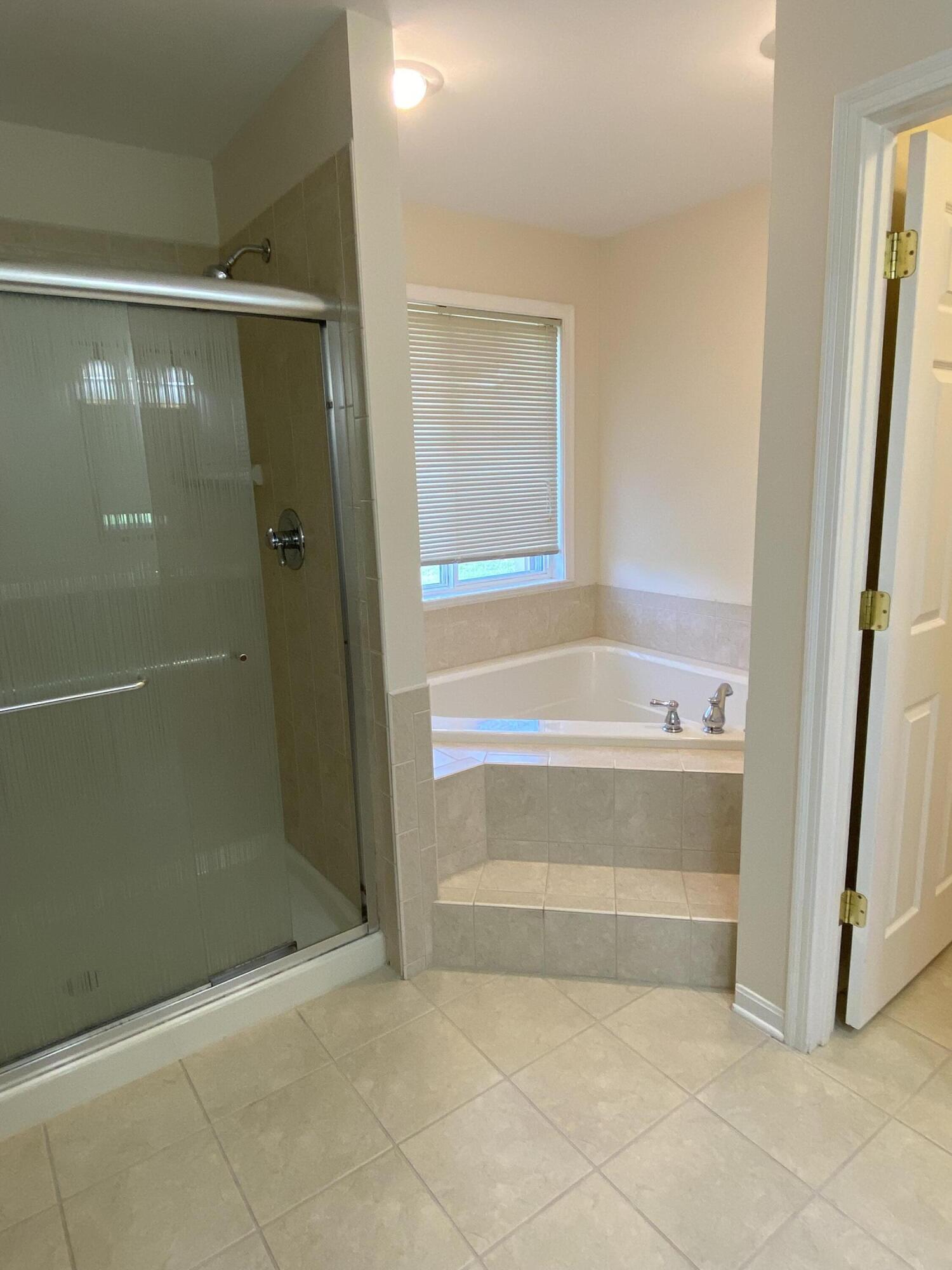 8964 Richmond Road Union, KY 41091 - Photo 25 of 48 Corner jetted tub with separate shower enclosure.