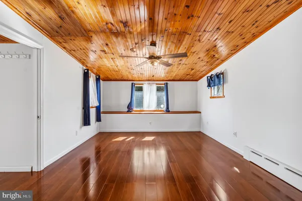 a view of entryway with wooden floor
