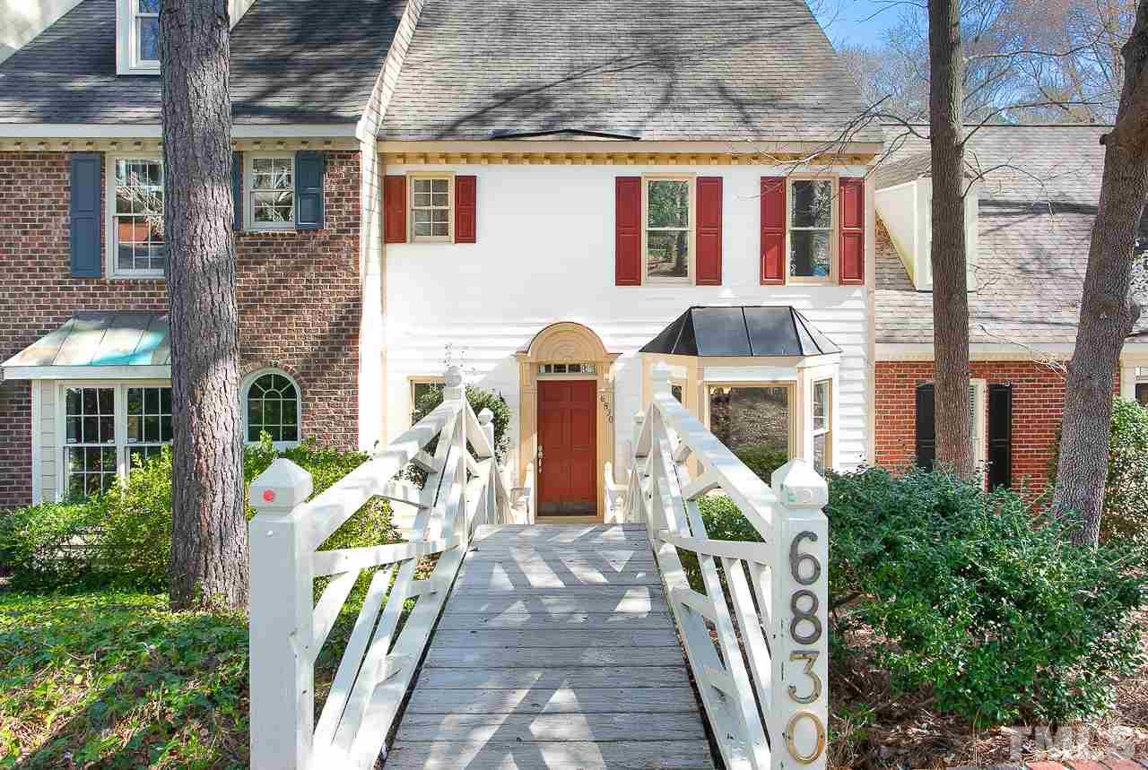6830 Gloucester Road Raleigh, NC 27612 - Photo 2 of 28 a front view of building with an outdoor space