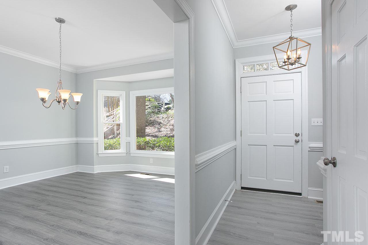 6830 Gloucester Road Raleigh, NC 27612 - Photo 11 of 28 a view interior of the house and wooden floor