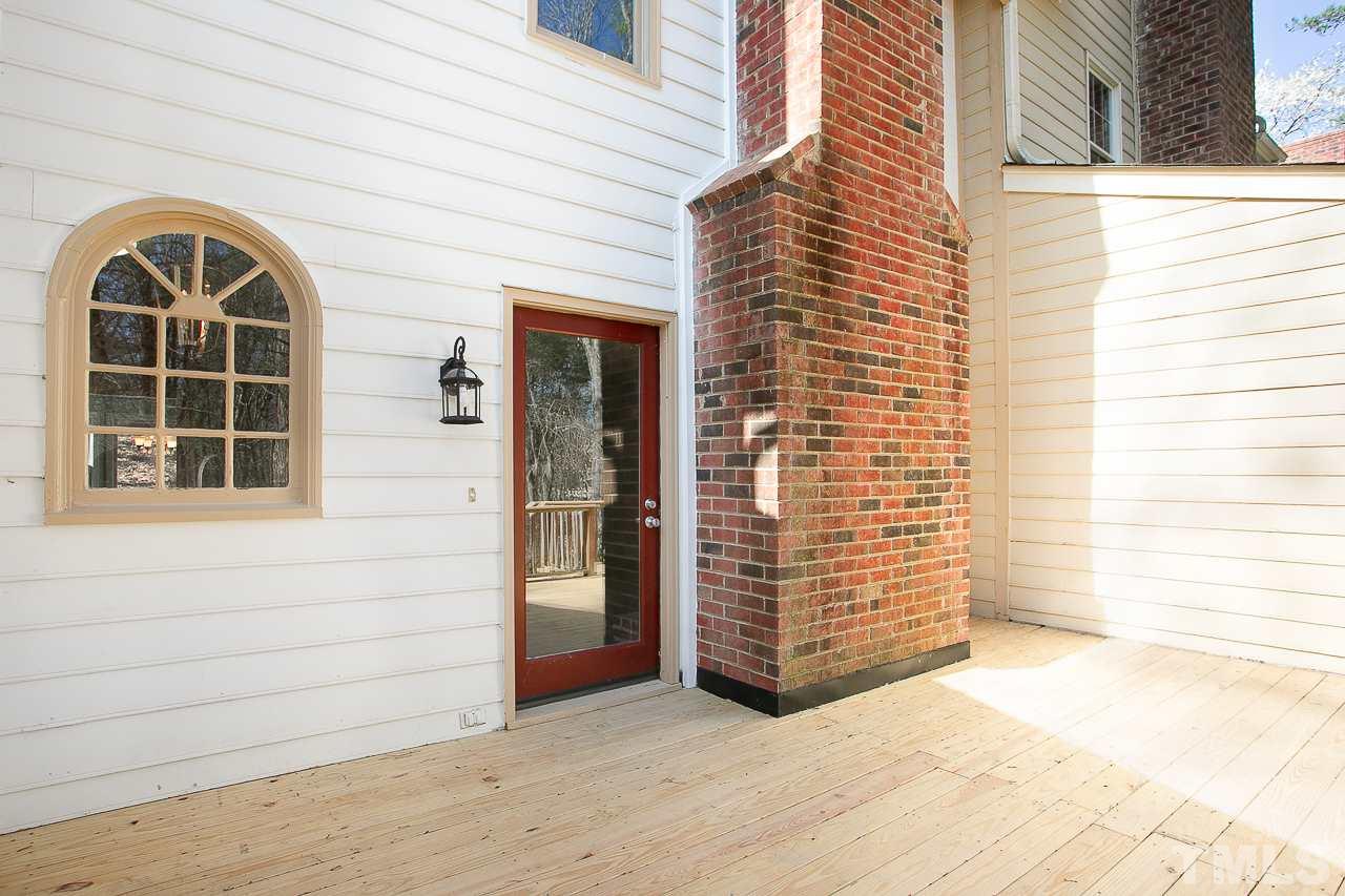 6830 Gloucester Road Raleigh, NC 27612 - Photo 26 of 28 a view of front door of house