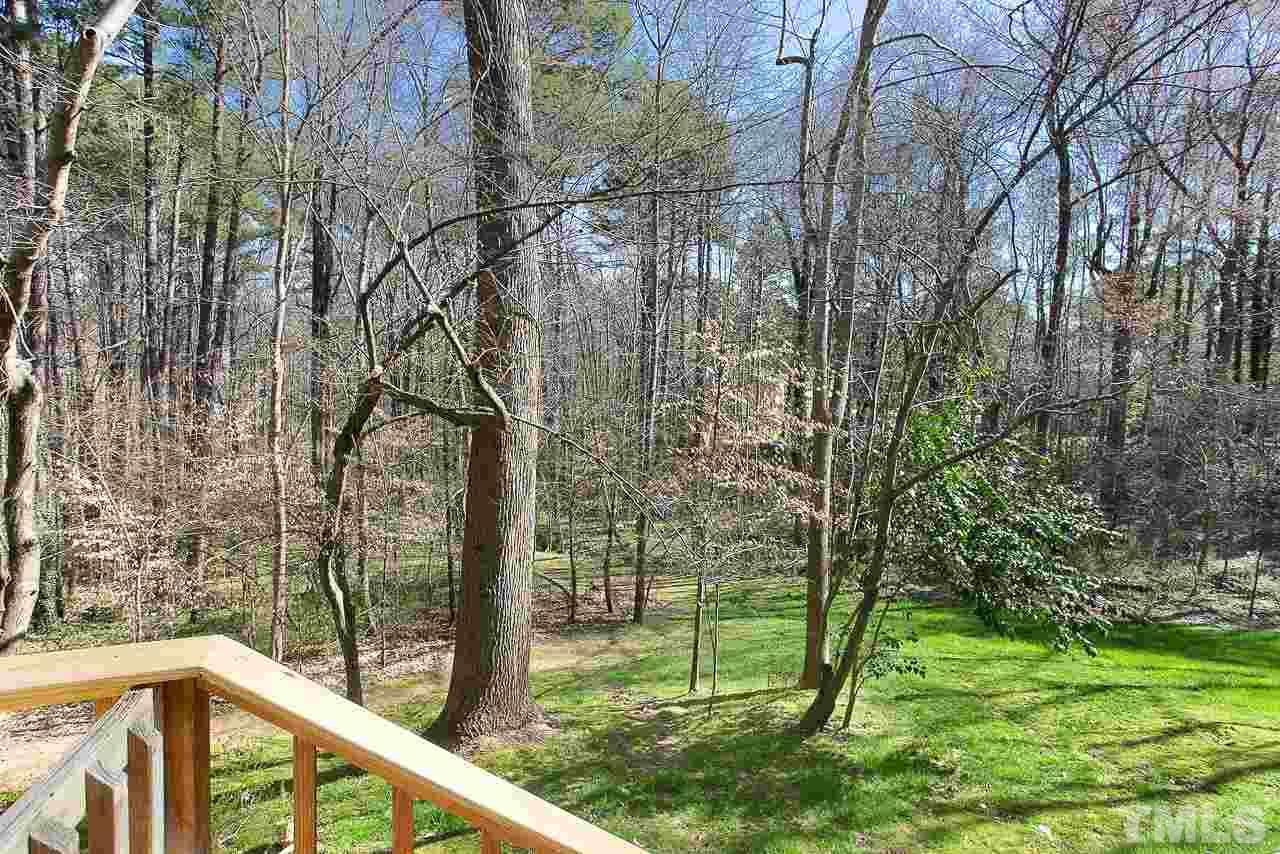 6830 Gloucester Road Raleigh, NC 27612 - Photo 27 of 28 a view of a wooden fence and trees