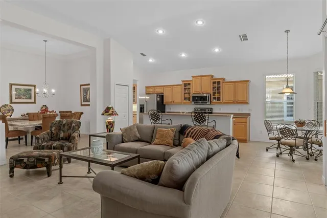 a kitchen with a sink and a stove top oven