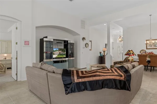 a kitchen with stainless steel appliances granite countertop a sink and a stove