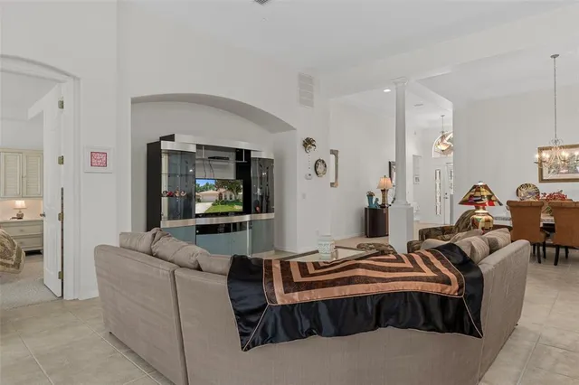 a kitchen with stainless steel appliances granite countertop a sink and a stove