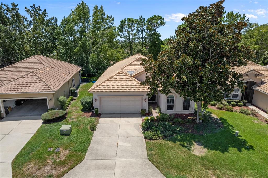 1031 West Diamond Shore Loop, Unit 5 Hernando, FL 34442 - Photo 2 of 69 a view of house with garden