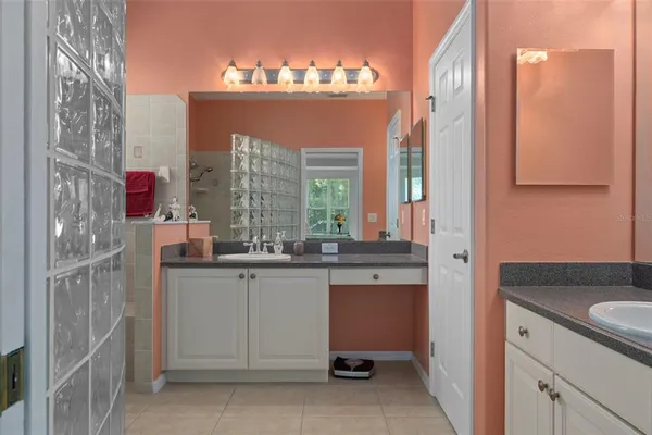 a view of outdoor space with green field and trees