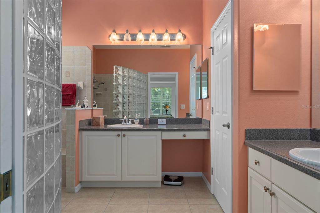 1031 West Diamond Shore Loop, Unit 5 Hernando, FL 34442 - Photo 30 of 69 a view of a bathroom with a sink and mirror