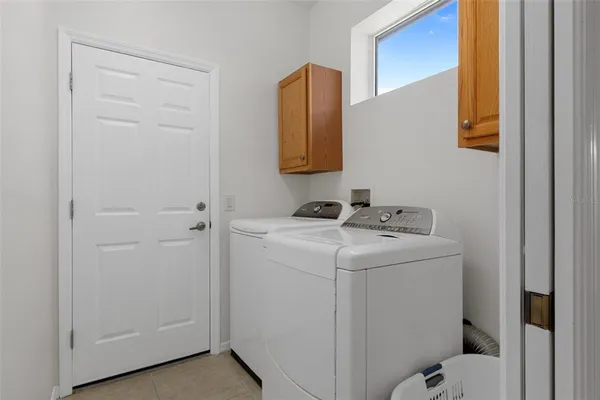an aerial view of a house with a garden