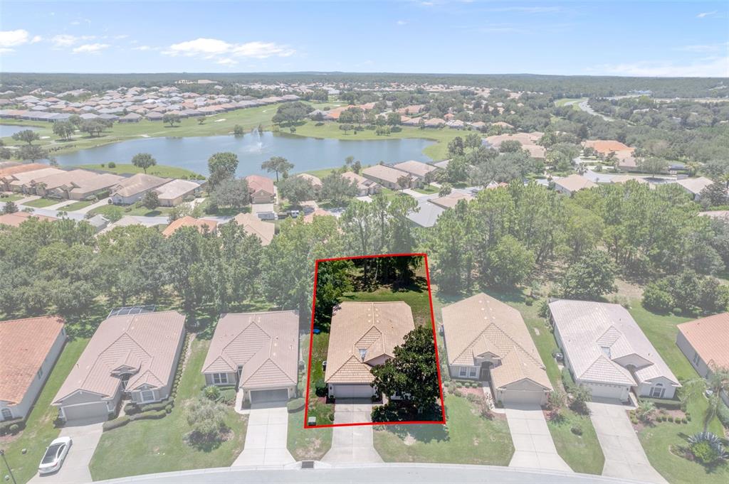 1031 West Diamond Shore Loop, Unit 5 Hernando, FL 34442 - Photo 4 of 69 an aerial view of a city with lots of residential buildings ocean and mountain view in back