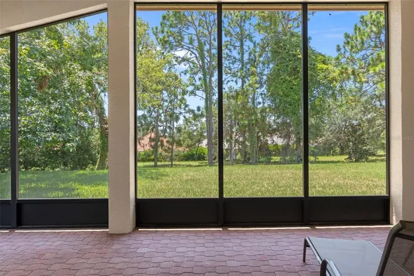 an aerial view of a residential houses with outdoor space