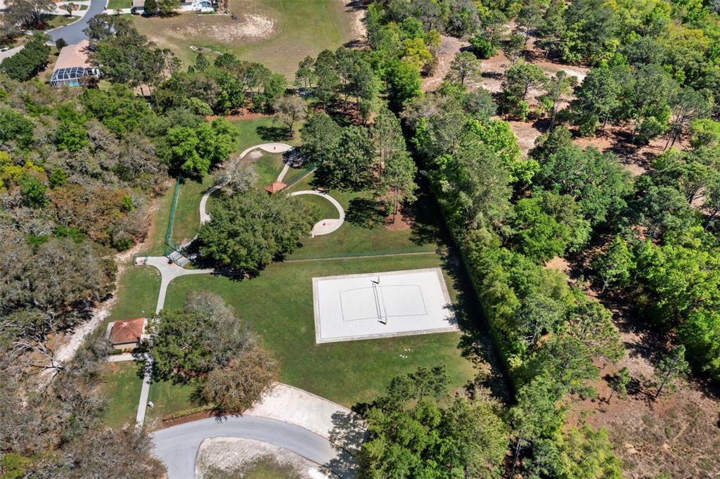 1031 West Diamond Shore Loop, Unit 5 Hernando, FL 34442 - Photo 49 of 69 an aerial view of a house with a yard and garden