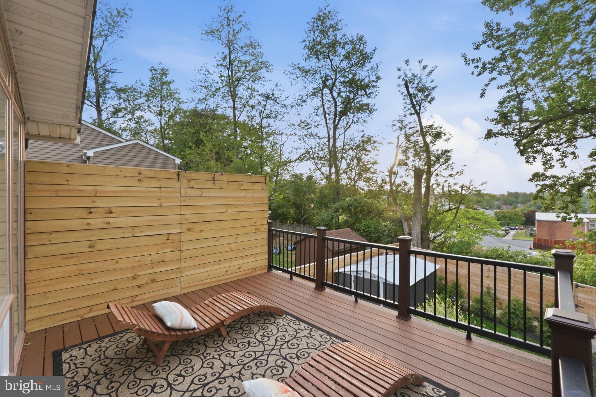 3311 Pendleton Drive Silver Spring, MD 20902 - Photo 31 of 45 a view of a balcony with wooden floor and fence