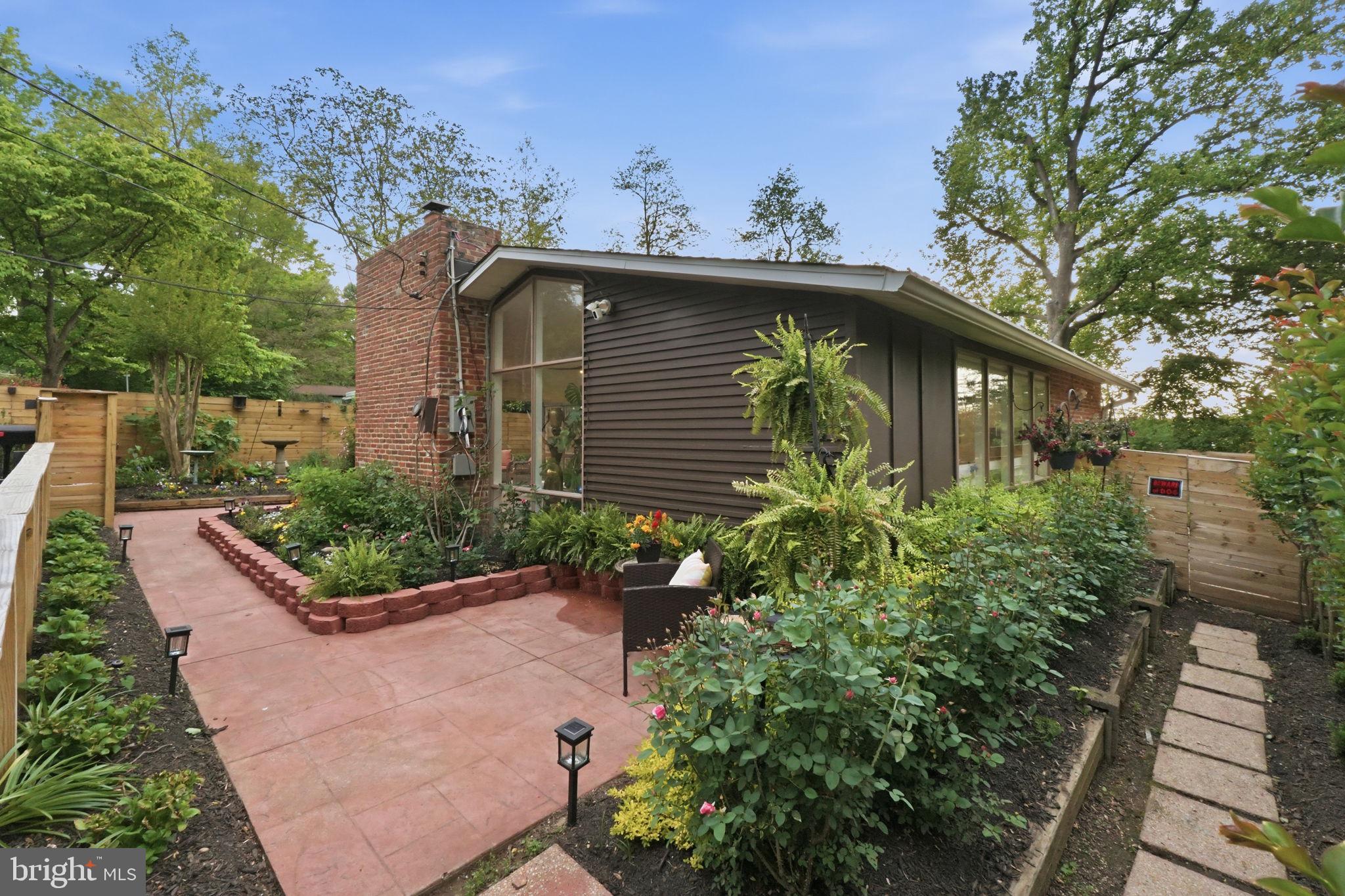 3311 Pendleton Drive Silver Spring, MD 20902 - Photo 38 of 45 a side view of a house with a yard