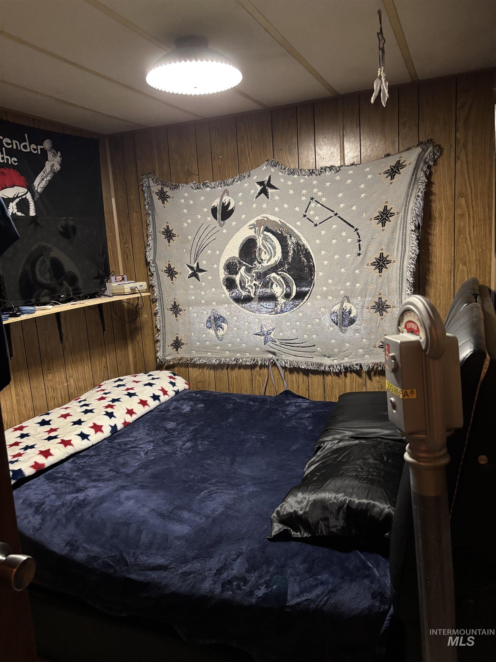 181 North Liberty Street Boise, ID 83704 - Photo 8 of 10 Bedroom with wooden walls