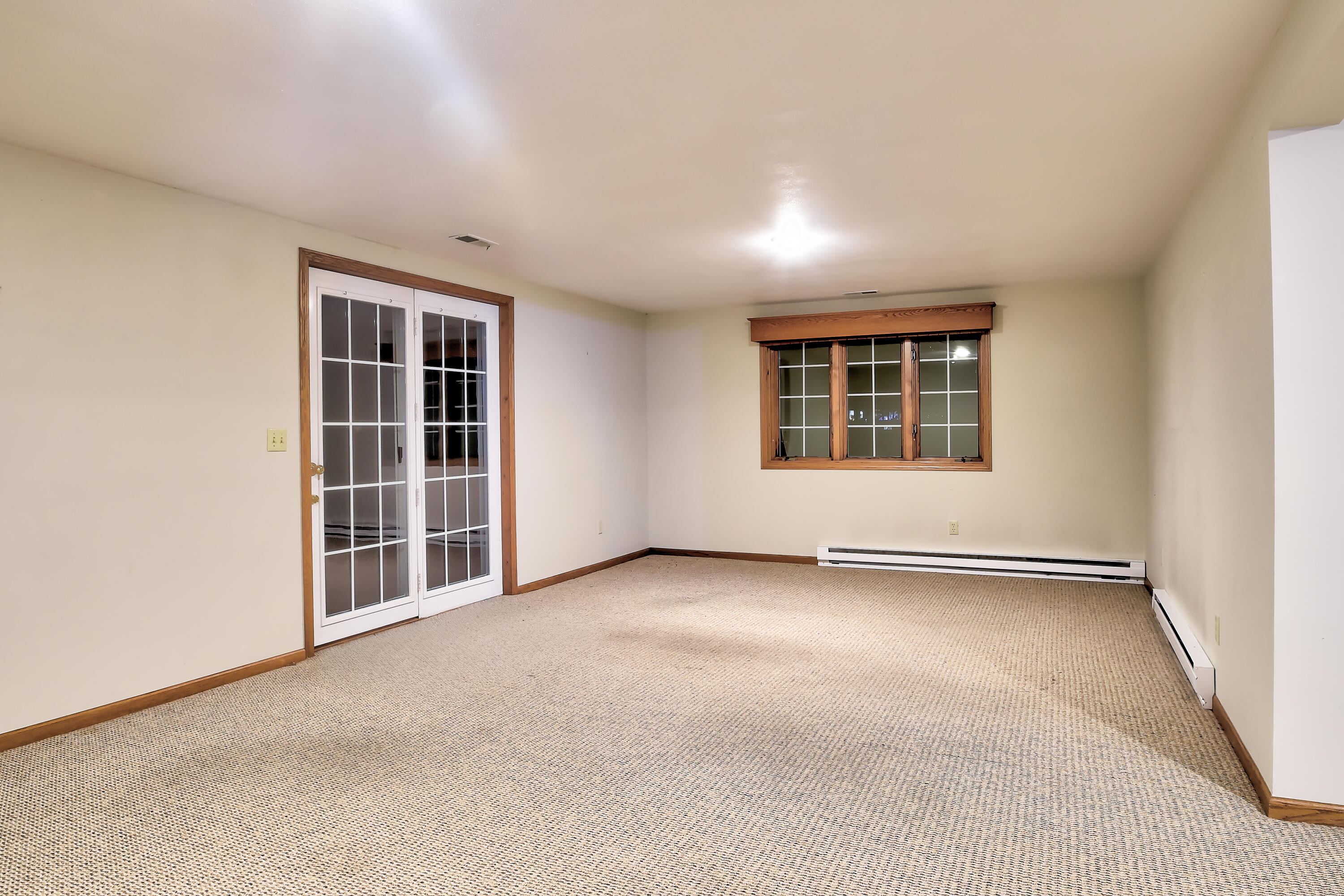 2214 Willowbrook Drive West Bend, WI 53090 - Photo 11 of 21 Large lower level rec room and office area