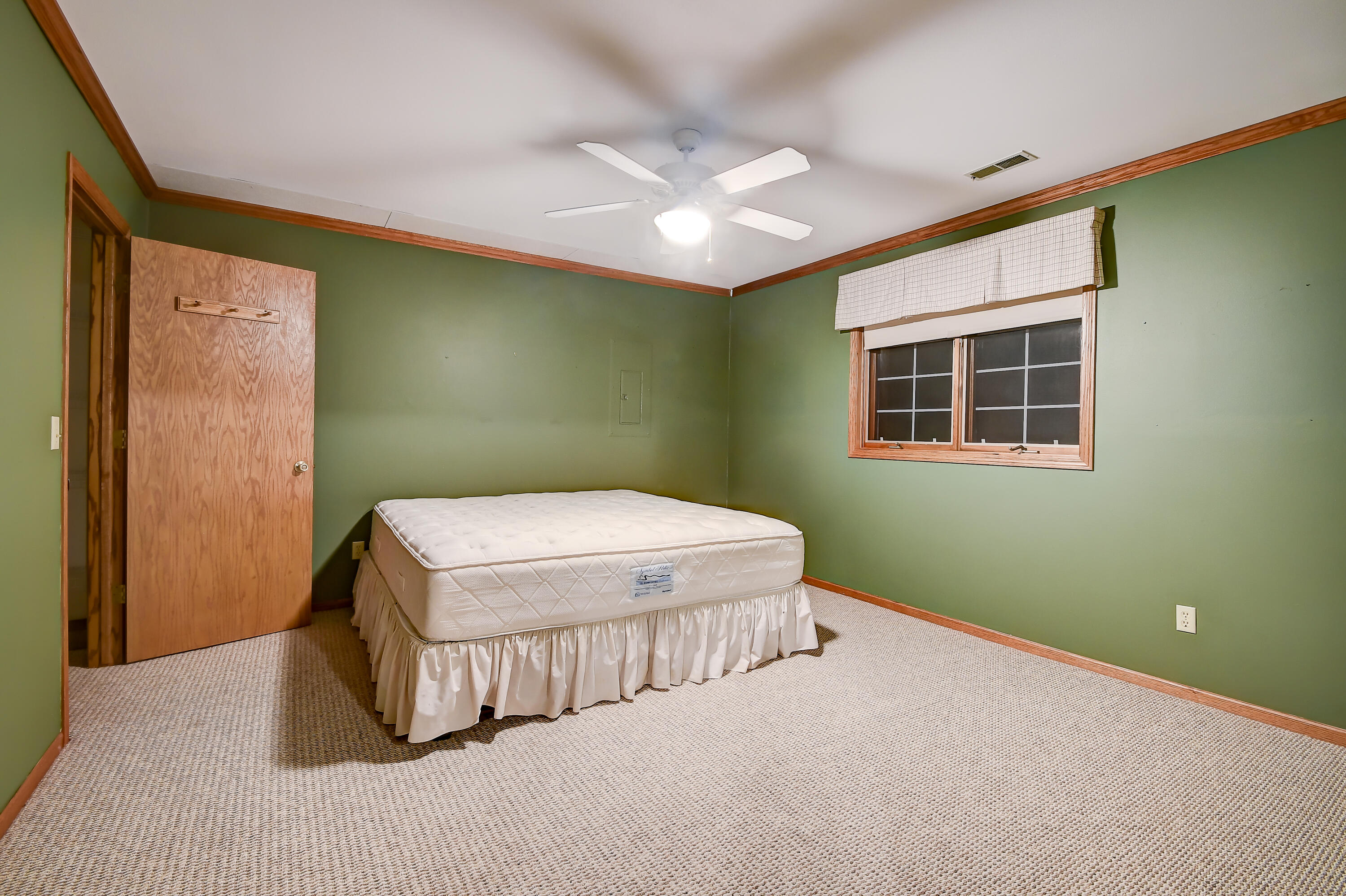 2214 Willowbrook Drive West Bend, WI 53090 - Photo 13 of 21 a spacious lower level bedroom and walk in closet