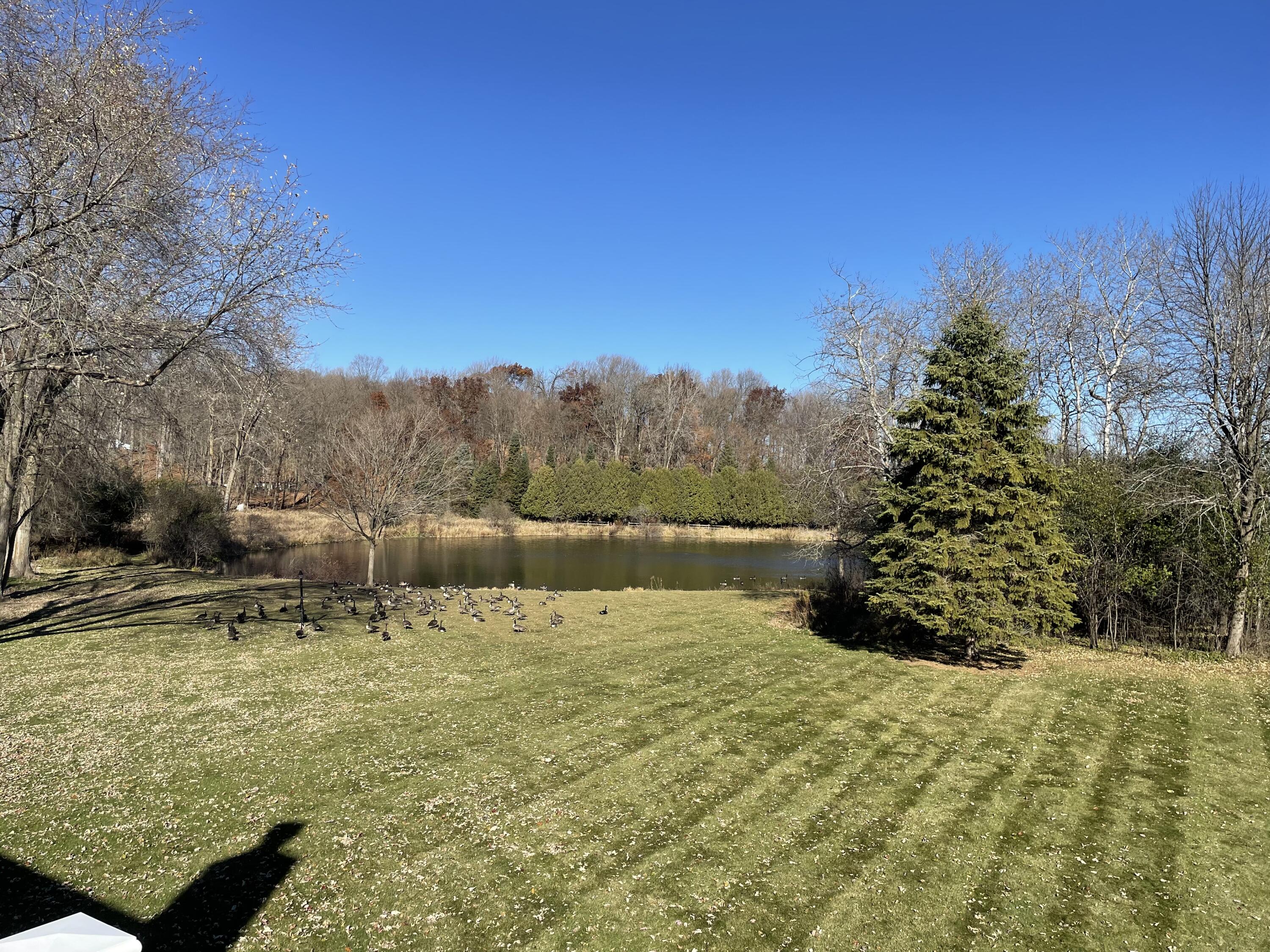 2214 Willowbrook Drive West Bend, WI 53090 - Photo 19 of 21 Welcome to Little Spring Lake out your back door