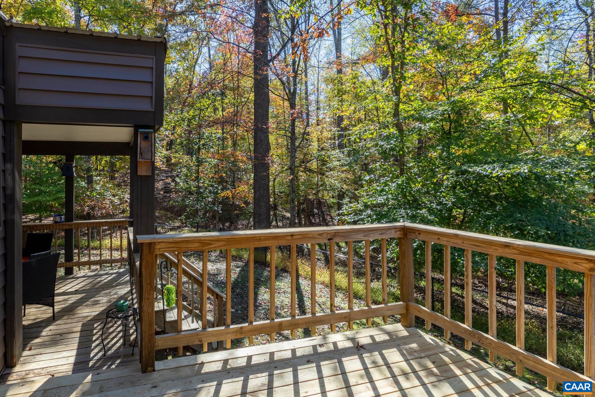 2530 Gillums Ridge Lane Charlottesville, VA 22903 - Photo 11 of 45 a view of a wooden deck
